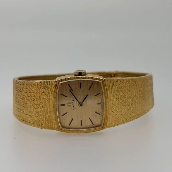 Montre Oméga vintage en or jaune